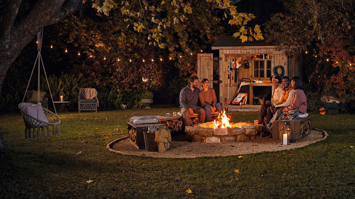 A group of friends around a campfire